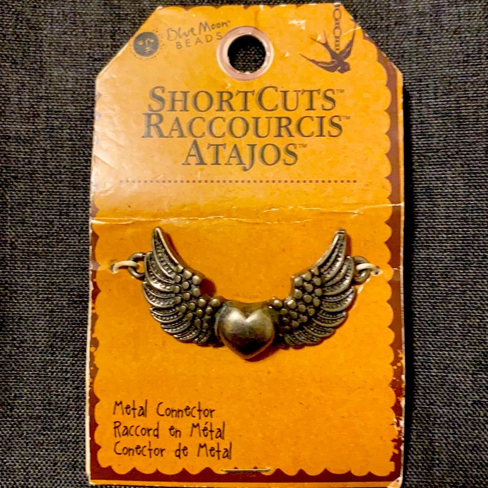 1 of a kind Heart between wings  Metal Connector